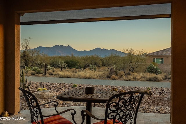 exterior space featuring a mountain view