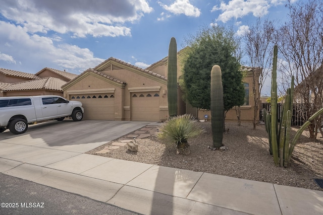 view of front of property with a garage