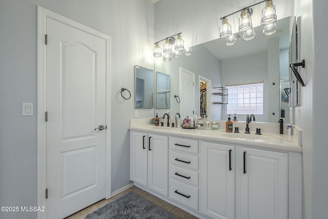 bathroom with vanity and tile patterned floors