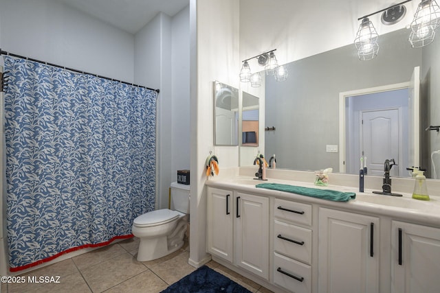 bathroom featuring vanity, tile patterned floors, toilet, and a shower with shower curtain