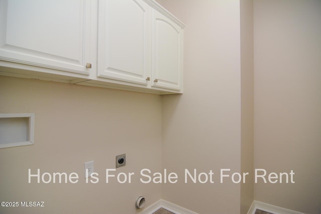 washroom featuring cabinets, washer hookup, and hookup for an electric dryer