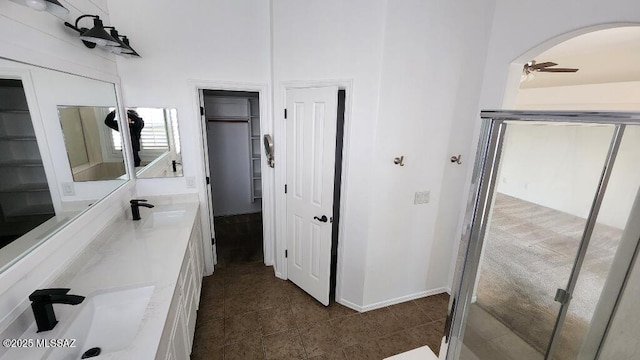 bathroom with vanity and ceiling fan