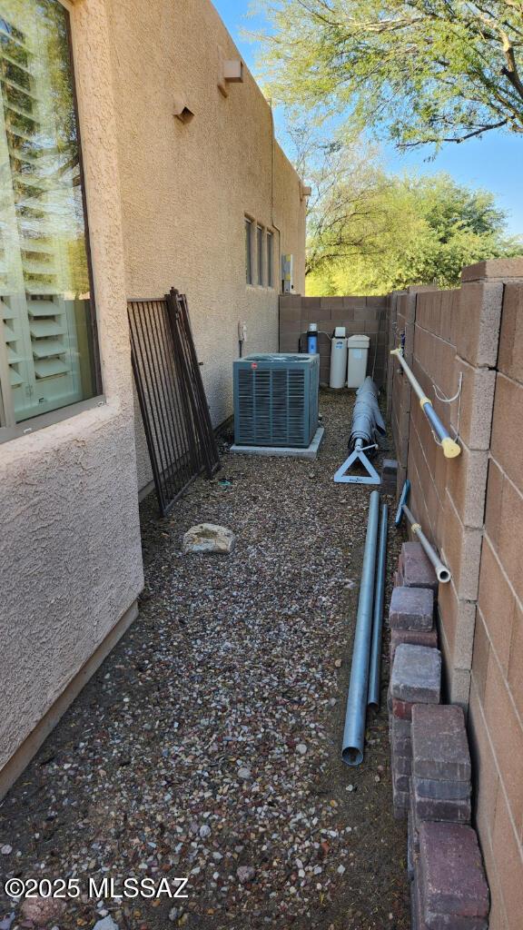 view of yard featuring central air condition unit