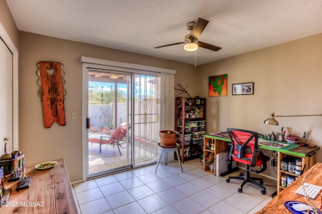 office featuring ceiling fan and light tile patterned floors