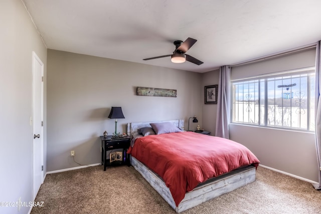 bedroom featuring ceiling fan and carpet floors