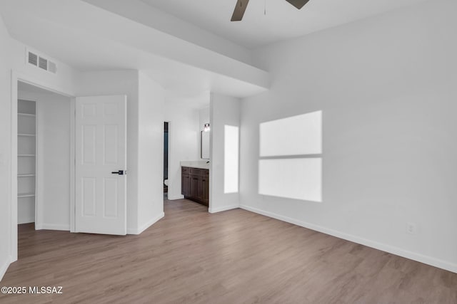 interior space featuring ceiling fan and light hardwood / wood-style flooring