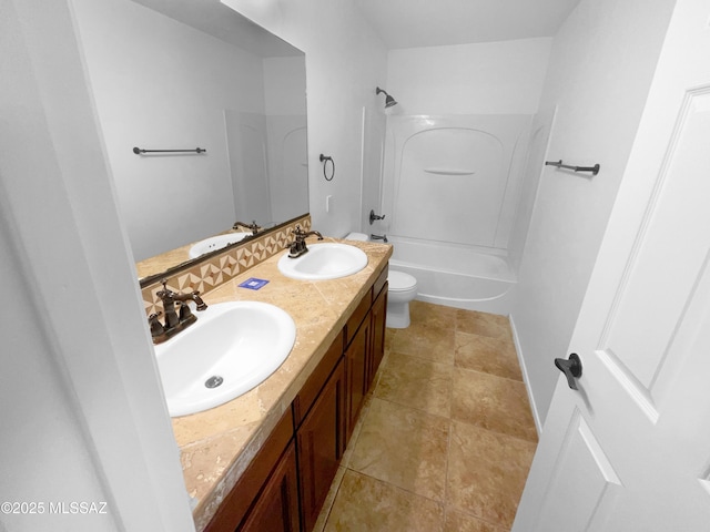 full bathroom featuring tile patterned flooring, vanity, shower / tub combination, and toilet