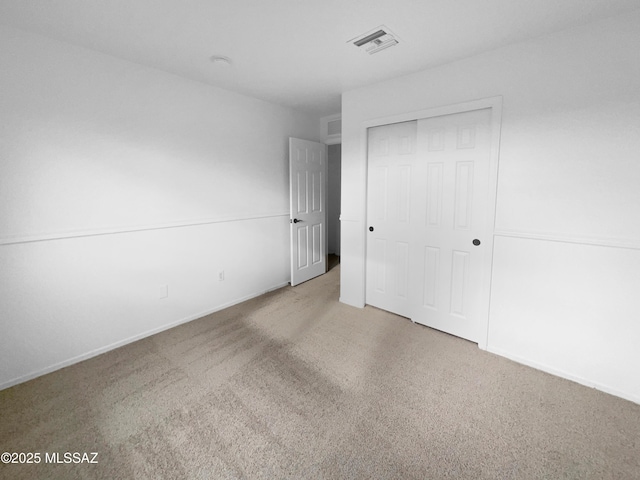 unfurnished bedroom with a closet