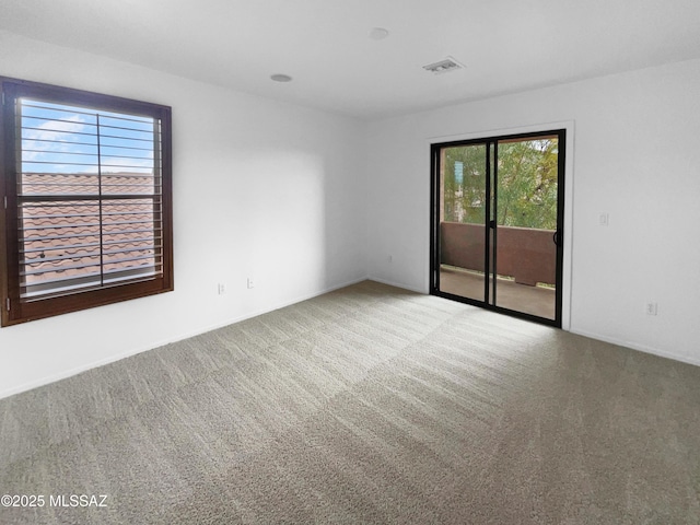 empty room featuring carpet