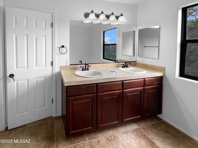 bathroom featuring vanity and plenty of natural light