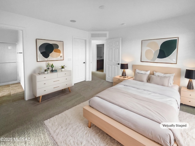 bedroom featuring dark colored carpet