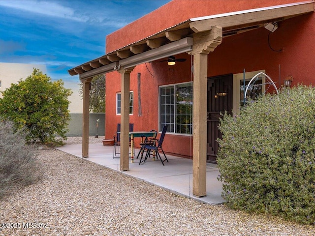 view of patio terrace at dusk