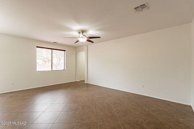 spare room featuring ceiling fan