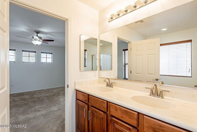 bathroom featuring vanity and ceiling fan