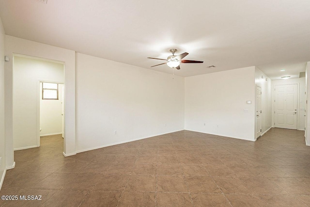 unfurnished room featuring ceiling fan