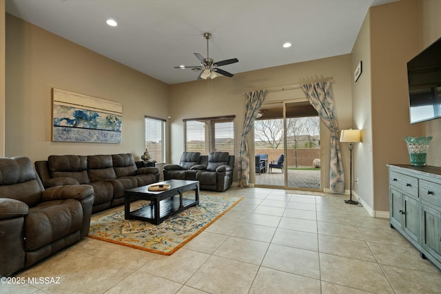 tiled living room featuring ceiling fan