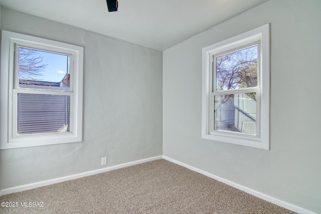 spare room with carpet flooring