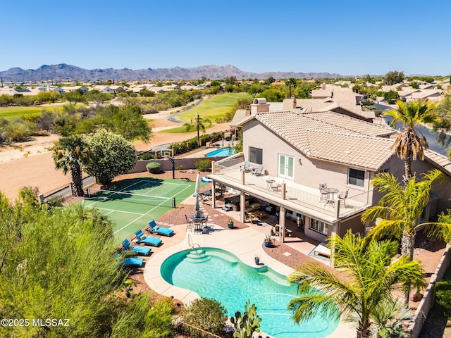 1943 W Desert Highlands Dr, Oro Valley, AZ 85737 - aerial view of a pool and a mountainous background