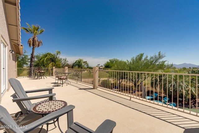 1943 W Desert Highlands Dr, Oro Valley, AZ 85737 - view of patio featuring a mountain view and a balcony