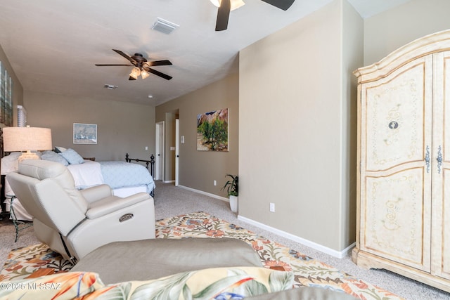 1943 W Desert Highlands Dr, Oro Valley, AZ 85737 - bedroom with light colored carpet, baseboards, and ceiling fan