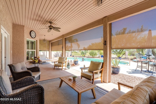 1943 W Desert Highlands Dr, Oro Valley, AZ 85737 - fenced backyard featuring an outdoor living space, an outdoor pool, ceiling fan, and a patio area