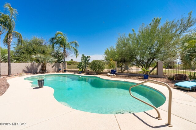 1943 W Desert Highlands Dr, Oro Valley, AZ 85737 - view of pool with a fenced backyard and a patio area