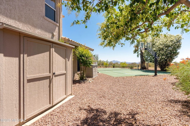 1943 W Desert Highlands Dr, Oro Valley, AZ 85737 - view of yard with basketball hoop