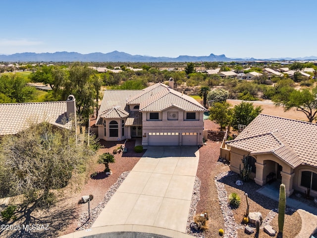 1943 W Desert Highlands Dr, Oro Valley, AZ 85737 - aerial view of property and surrounding area with a mountainous background
