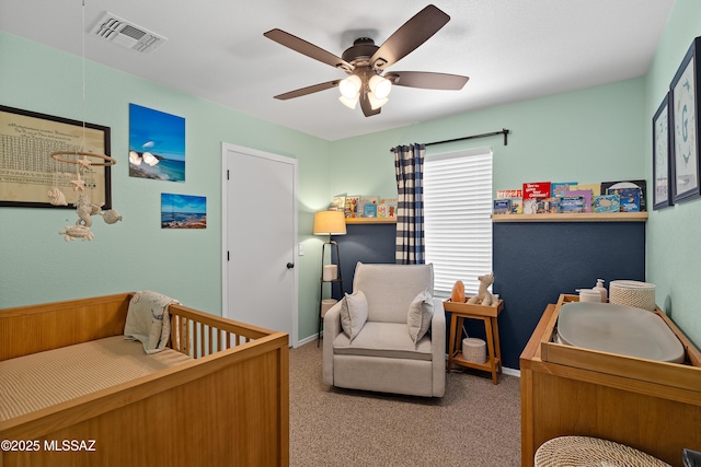 bedroom with ceiling fan and carpet flooring