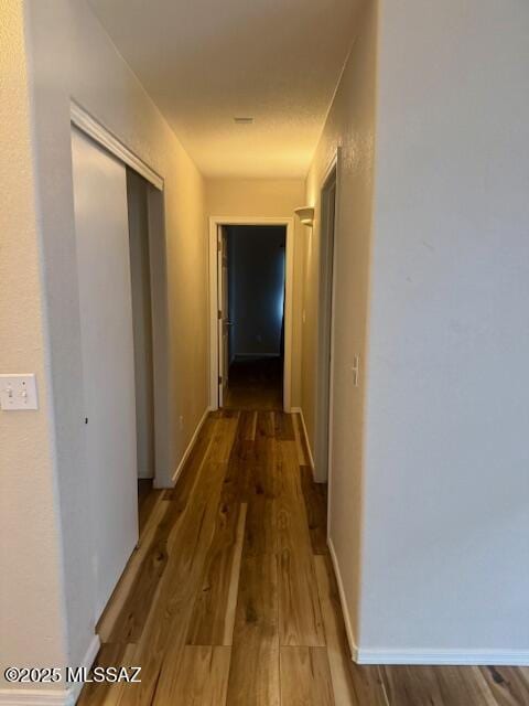 hallway featuring hardwood / wood-style floors