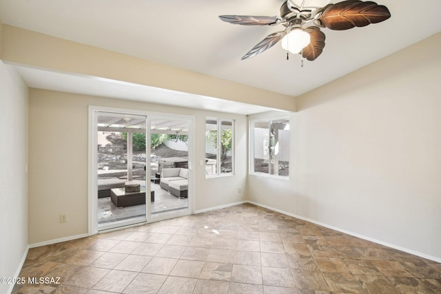 spare room featuring ceiling fan