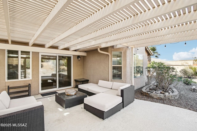 view of patio featuring an outdoor living space and a pergola