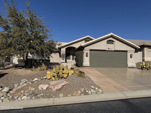 view of front of property featuring a garage