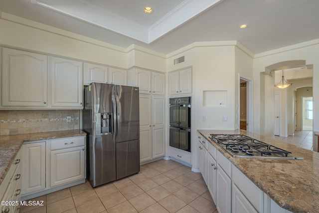 kitchen with white cabinetry and appliances with stainless steel finishes