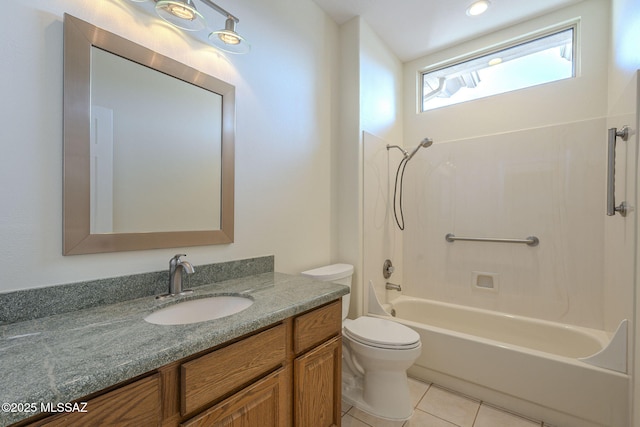 full bathroom featuring shower / washtub combination, vanity, tile patterned floors, and toilet