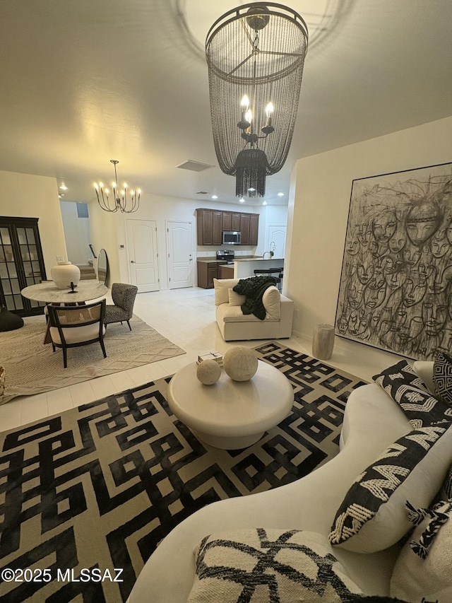 living room featuring an inviting chandelier