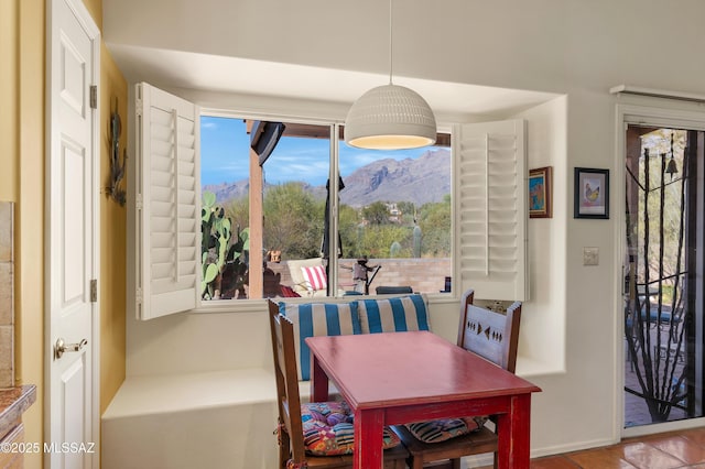 dining area with a mountain view