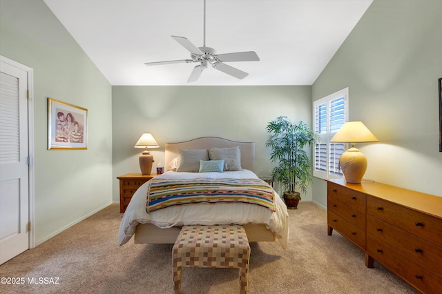 carpeted bedroom with lofted ceiling and ceiling fan