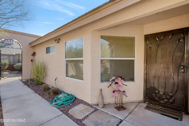 view of property exterior with a patio