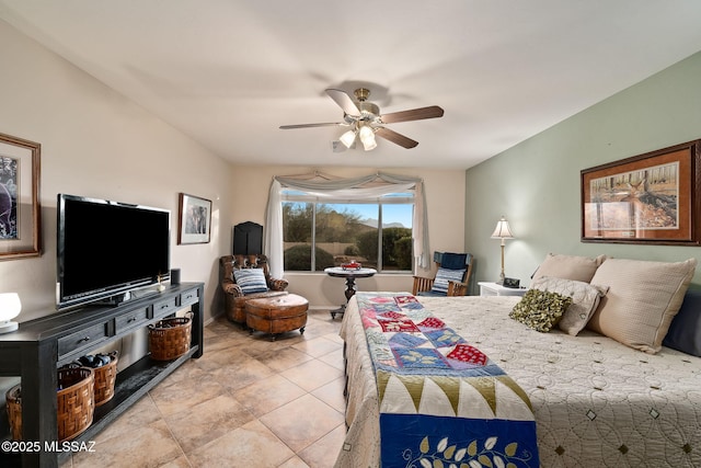 tiled bedroom with ceiling fan