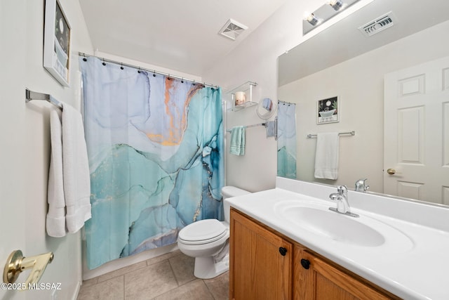 bathroom featuring vanity, a shower with curtain, tile patterned floors, and toilet