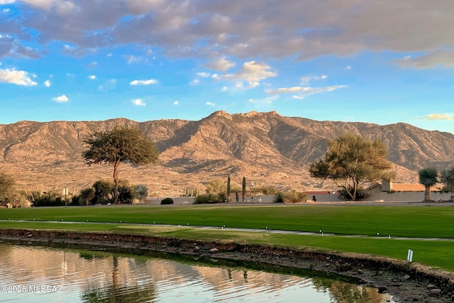 view of mountain feature with a water view