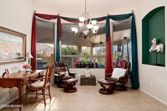 living area with ceiling fan with notable chandelier and light tile patterned floors