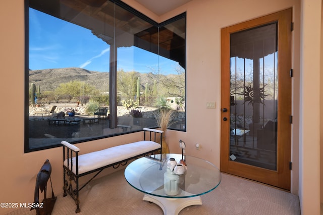 dining room featuring a mountain view