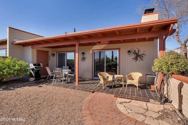 back of house featuring a patio