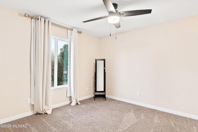 unfurnished room featuring carpet flooring and ceiling fan