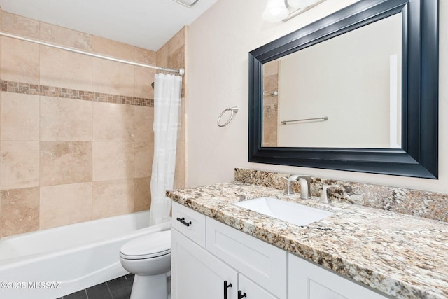 full bathroom with vanity, shower / bath combination with curtain, and toilet