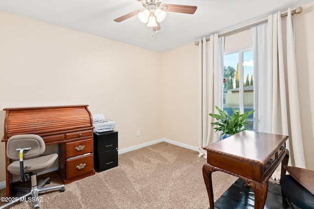 office with carpet floors and ceiling fan