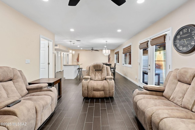 living room featuring ceiling fan