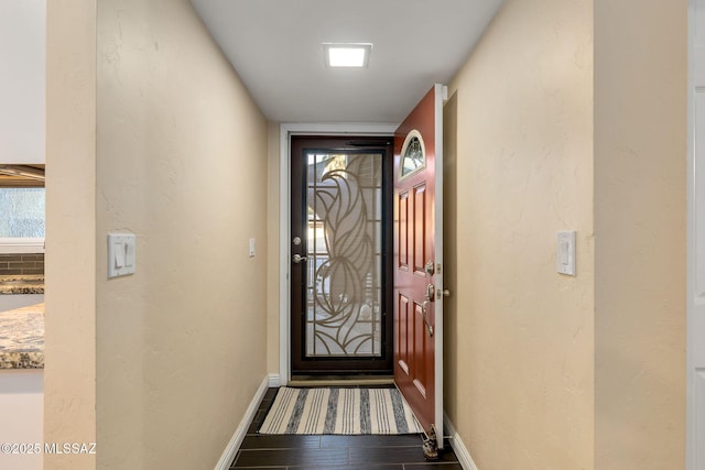 doorway to outside featuring hardwood / wood-style floors